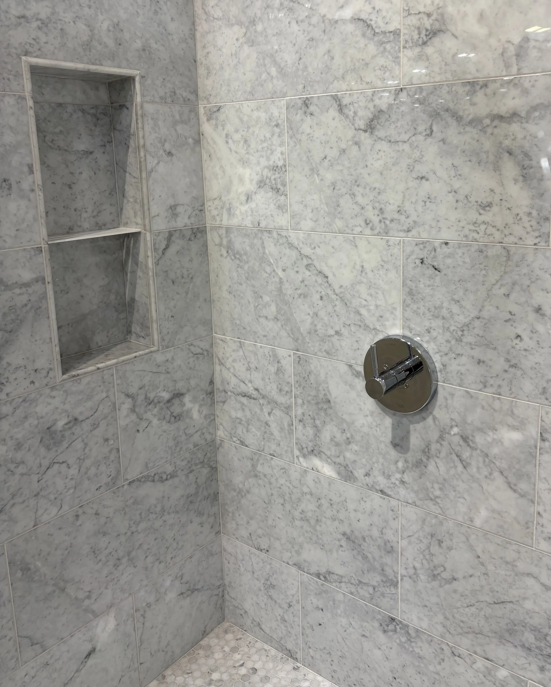 Custom tile shower and vanity in a bathroom remodel